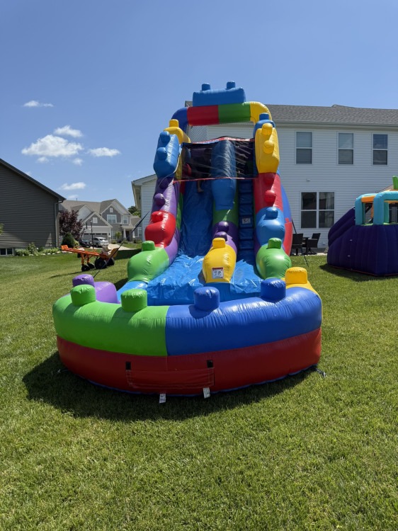 Bounce house rental setup in Florissant MO backyard — Jump & Jam Party Rentals